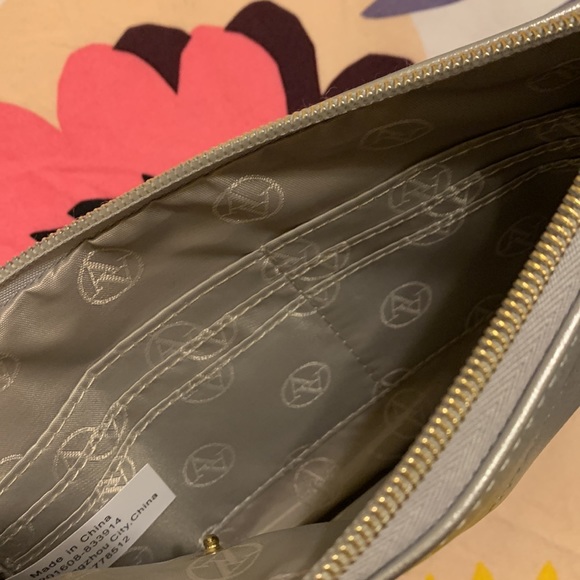 Adrienne Vittadini Silver Charging Wristlet - Picture 3 of 5